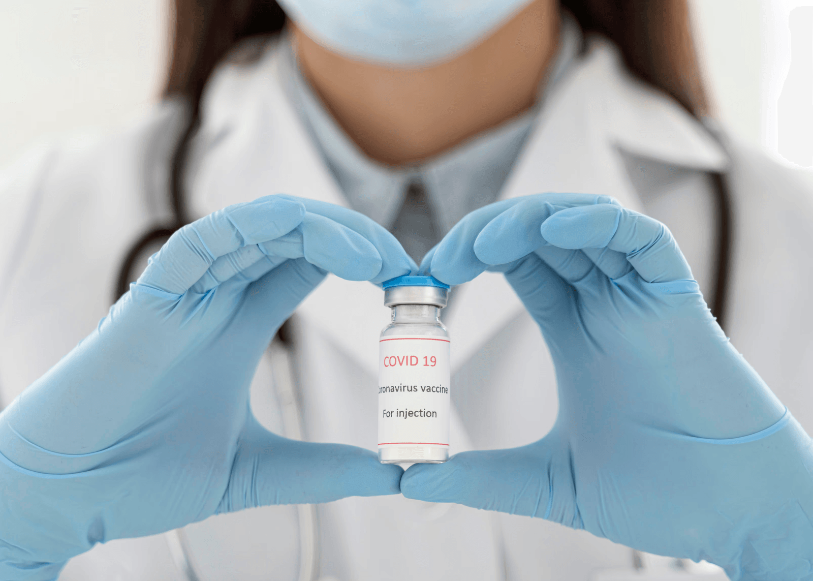 635b91873375da2b4f352877_609b8e6d40e821868d0694db_doctor-holding-vaccine-recipient