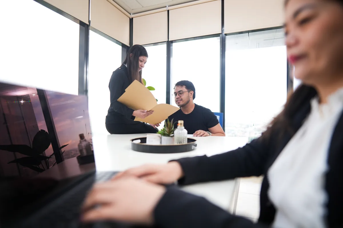 Professional accounting assistant working on financial documents